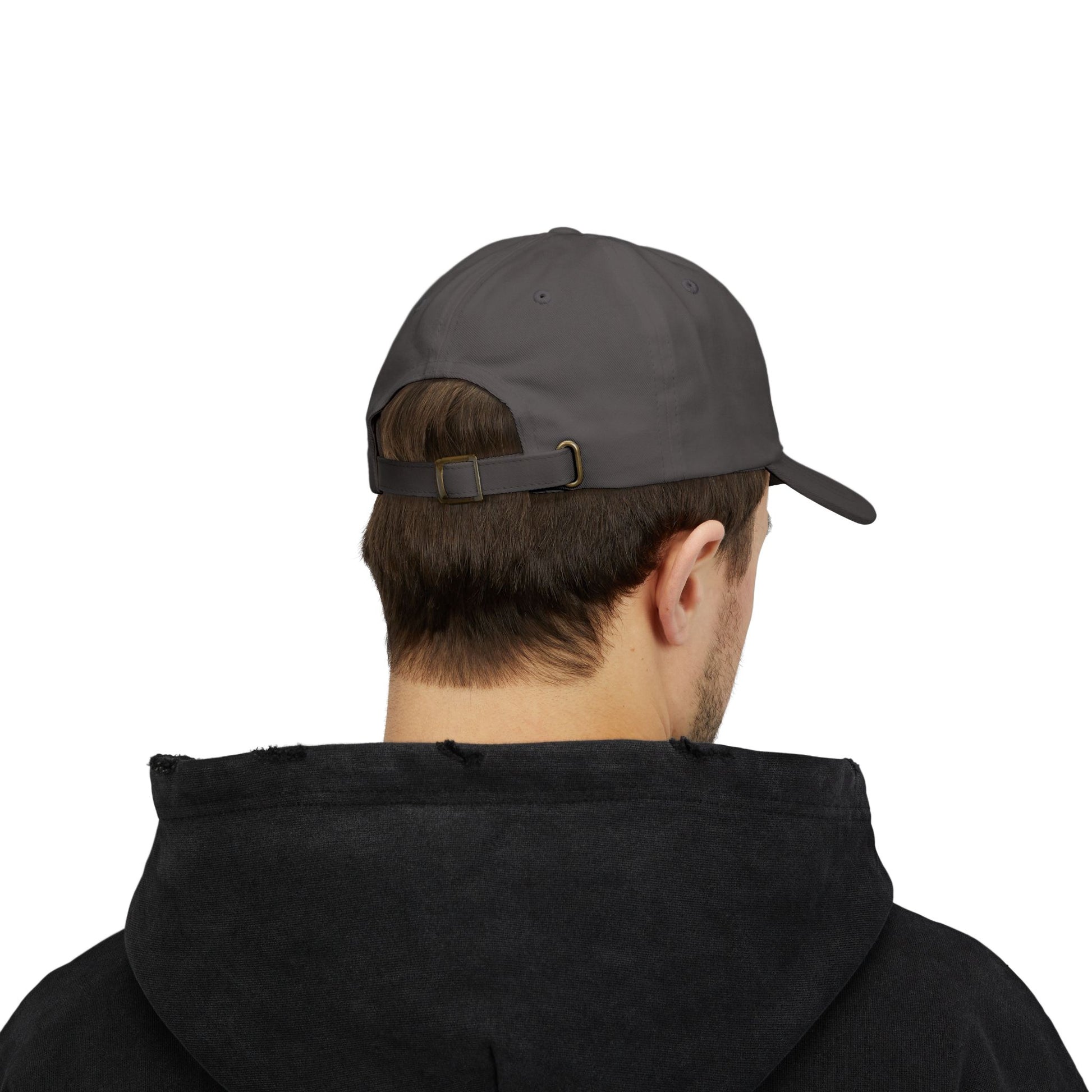 Male model wearing a red Classic Dad Cap from the Astral Signature Collection, showcasing its trendy design. This unisex baseball hat is perfect for casual events, making it a great gift idea for Father's Day or for enhancing his everyday fashion.