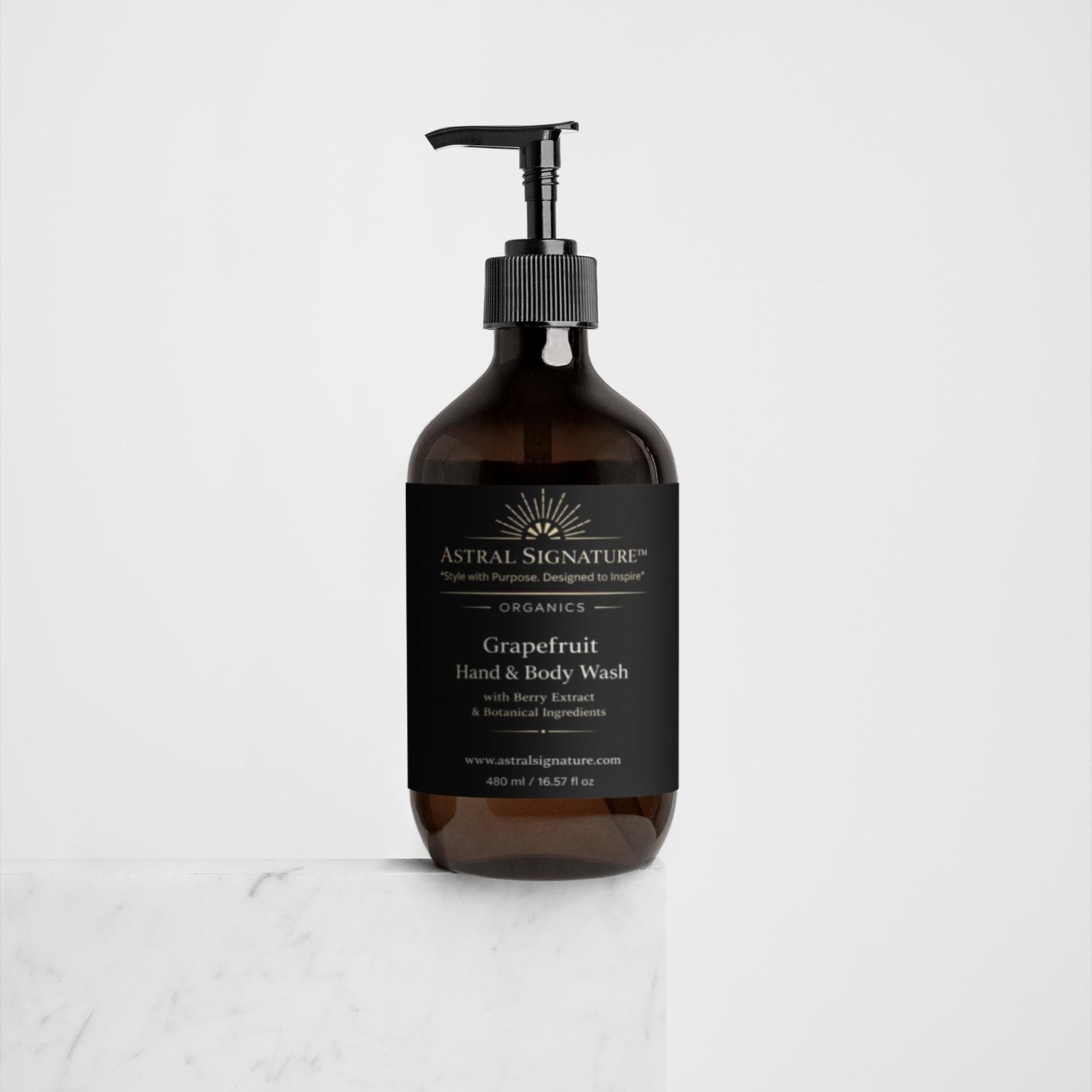 Astral Signature™ Hand & Body Wash Cleanses, Grapefruit showcased in elegant amber packaging, great for all skin types. Infused with Betaine as an active ingredient, this gentle and hydrating body wash combats dehydrated skin concerns. Ideal for everyday body-care, it is vegan and provides a revitalizing grapefruit experience.