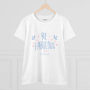 The Be Fabulous Tee by Astral Signature displayed on a wooden hanger, highlighting the inspirational graphic. This Inspirational Graphic Shirt combines comfort and style, perfect for women looking for unique pieces in their Women's T-Shirt lineup. A great choice for those who love feminine attire.