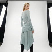 Back view of the Dreamy Ball Wool Dress by PremiumStyle Co.,Limited in light gray, emphasizing the unique draping and asymmetric hem design. This stunning Asymmetric Hem Wool Dress represents an epitome of women's fashion, ideal for an elegant wardrobe.