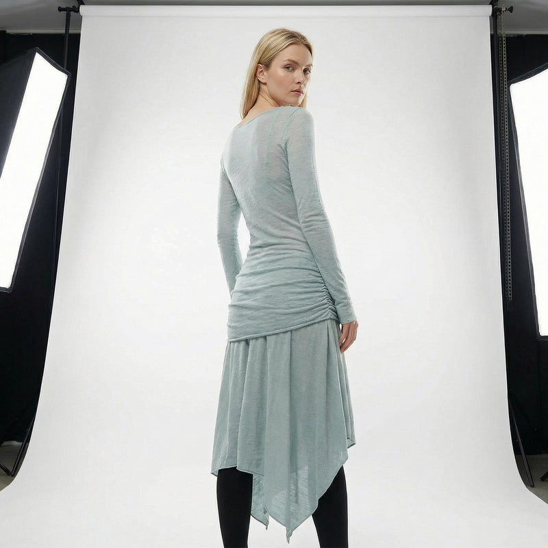 Back view of the Dreamy Ball Wool Dress by PremiumStyle Co.,Limited in light gray, emphasizing the unique draping and asymmetric hem design. This stunning Asymmetric Hem Wool Dress represents an epitome of women's fashion, ideal for an elegant wardrobe.