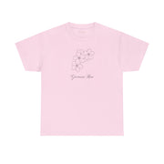 Front view of the Giovanni Reni Floral Script Tee, 'Guerrera Rosa', in a pastel pink, featuring a flower graphic, highlighted as a Women’s Relaxed Tee by Astral Signature.
