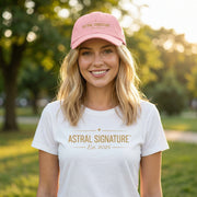Woman smiling while wearing the Classic Dad Cap by Astral Signature™ in pink, representing summer fashion and casual style. This trendy dad hat is the perfect gift for dad and adds a stylish touch to any outfit.