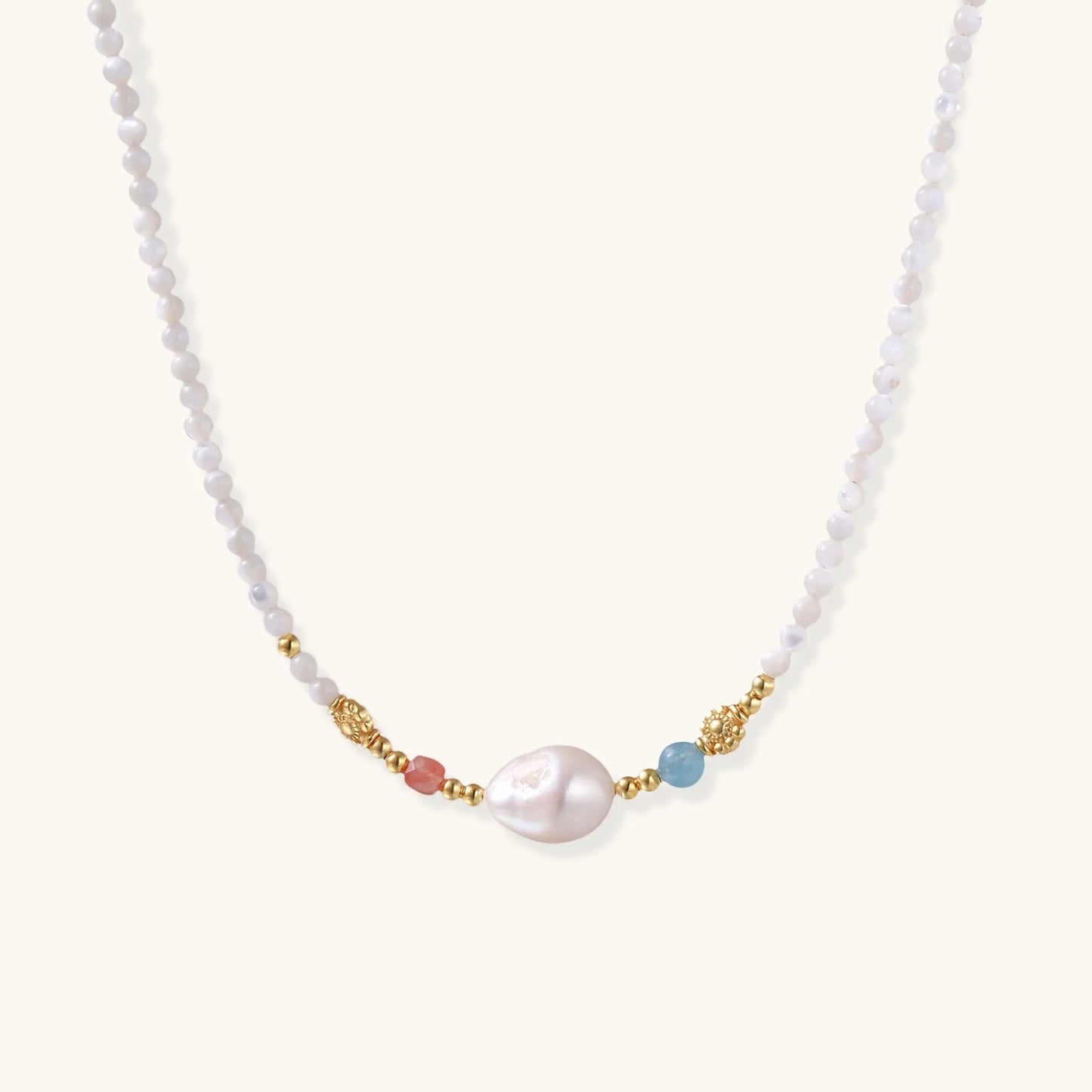 Close-up of the Pearl Garden Beaded Necklace from Astral Signature, highlighting the unique baroque freshwater pearl and vibrant stones. Ideal for gifting, this limited edition necklace emphasizes Astral Design.