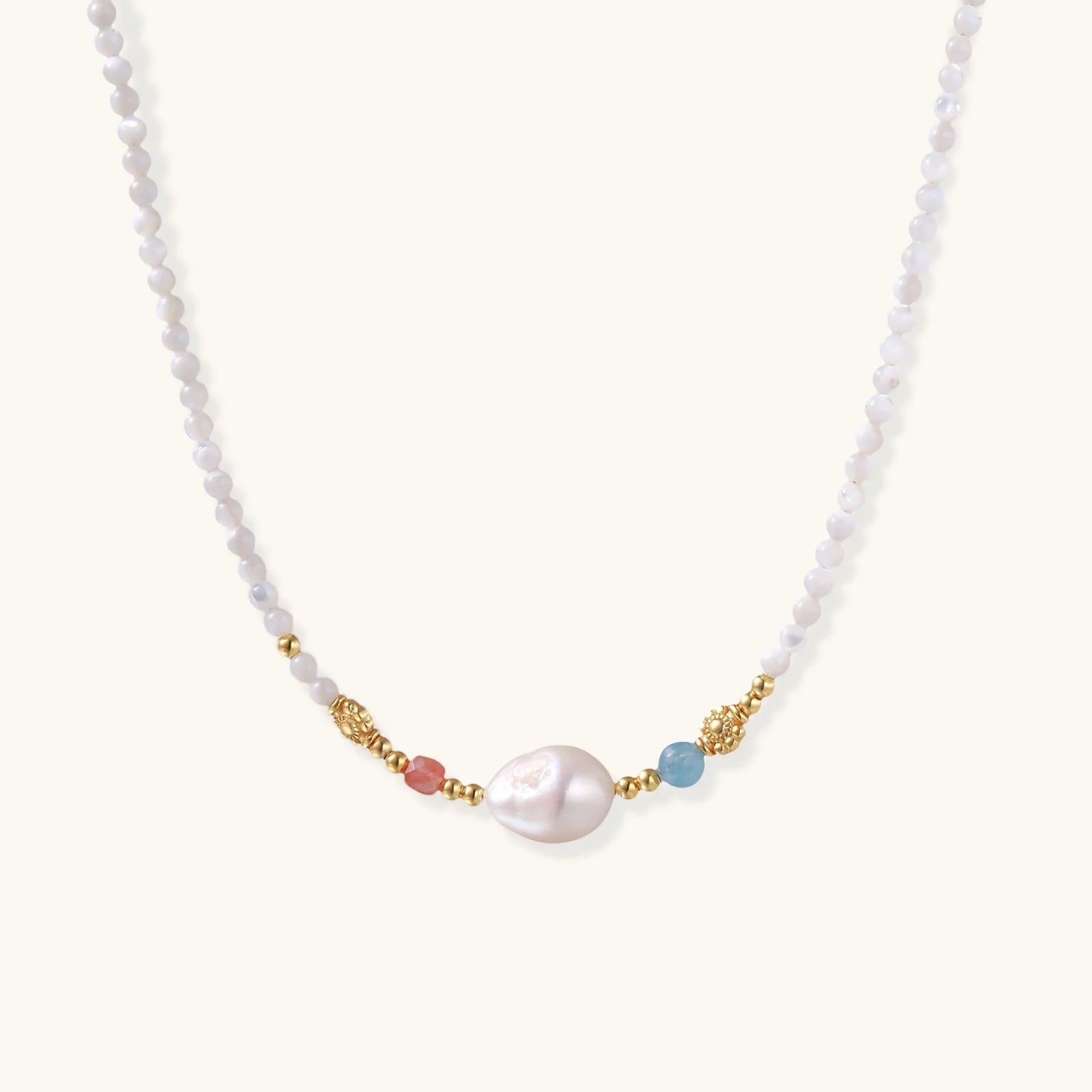 Close-up of the Pearl Garden Beaded Necklace from Astral Signature, highlighting the unique baroque freshwater pearl and vibrant stones. Ideal for gifting, this limited edition necklace emphasizes Astral Design.