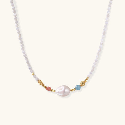 Close-up of the Pearl Garden Beaded Necklace from Astral Signature, highlighting the unique baroque freshwater pearl and vibrant stones. Ideal for gifting, this limited edition necklace emphasizes Astral Design.