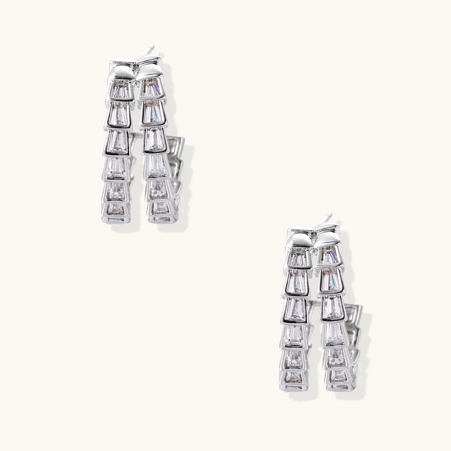 White gold-plated hoop earrings with double row of baguette-cut zirconia stones in geometric ladder design