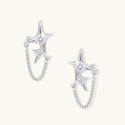Stardust Chain Studs earrings by Astral Signature, featuring delicate star-shaped designs linked by chains, crafted from Eco-Brass. These sterling silver (S925) earrings are adorned with Zirconia, making them a perfect gift for her.