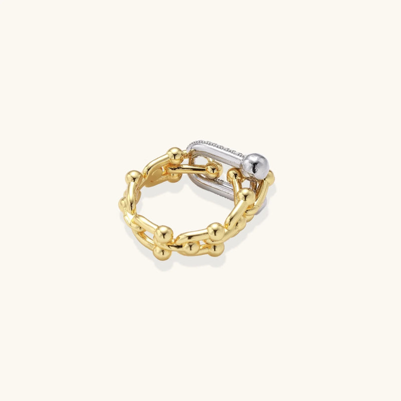 A side perspective of the Chain Link Power Ring by Astral Signature, showcasing its beautifully crafted details and shimmering stones. This stylish piece is perfect for everyday wear and makes a fantastic gift for her, highlighting the limited edition craftsmanship from Astral Design.