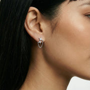 Close-up of Stardust Chain Studs earrings worn by a model, showcasing the Eco-Brass design by Astral Signature. The earrings feature sparkling Zirconia and hypoallergenic sterling silver (S925) posts, making them a perfect gift for her.