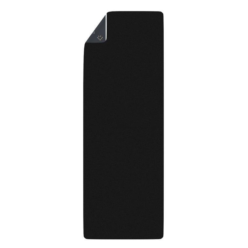 The back view of Astral Signature™ Rubber Yoga Mat, featuring a sleek black design. This versatile yoga mat is perfect for various workouts, including pilates, meditation, and home yoga sessions, ensuring a lightweight and portable experience.