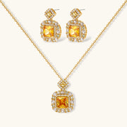 Heirloom Square square gold jewelry set featuring a vibrant yellow pendant necklace and matching earrings with zirconia accents by Astral Signature.