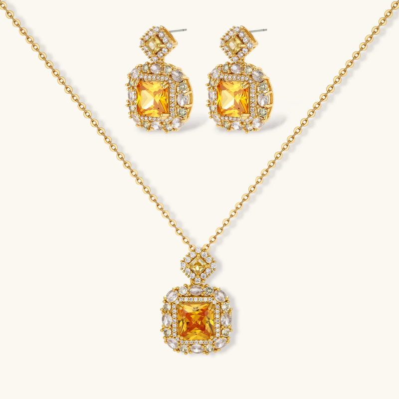 Heirloom Square square gold jewelry set featuring a vibrant yellow pendant necklace and matching earrings with zirconia accents by Astral Signature.