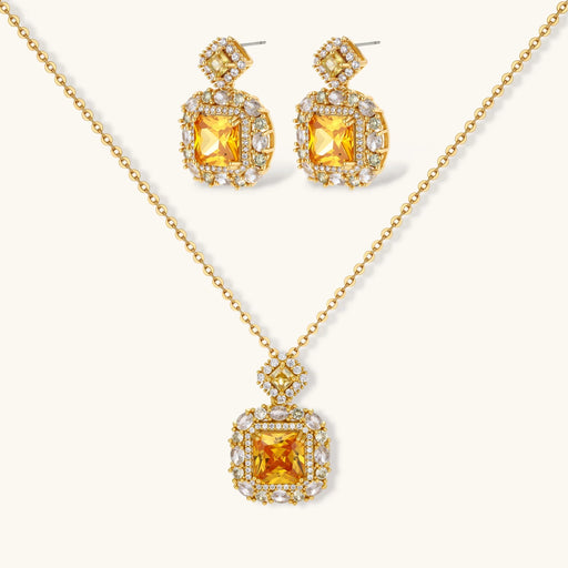 Heirloom Square square gold jewelry set featuring a vibrant yellow pendant necklace and matching earrings with zirconia accents by Astral Signature.