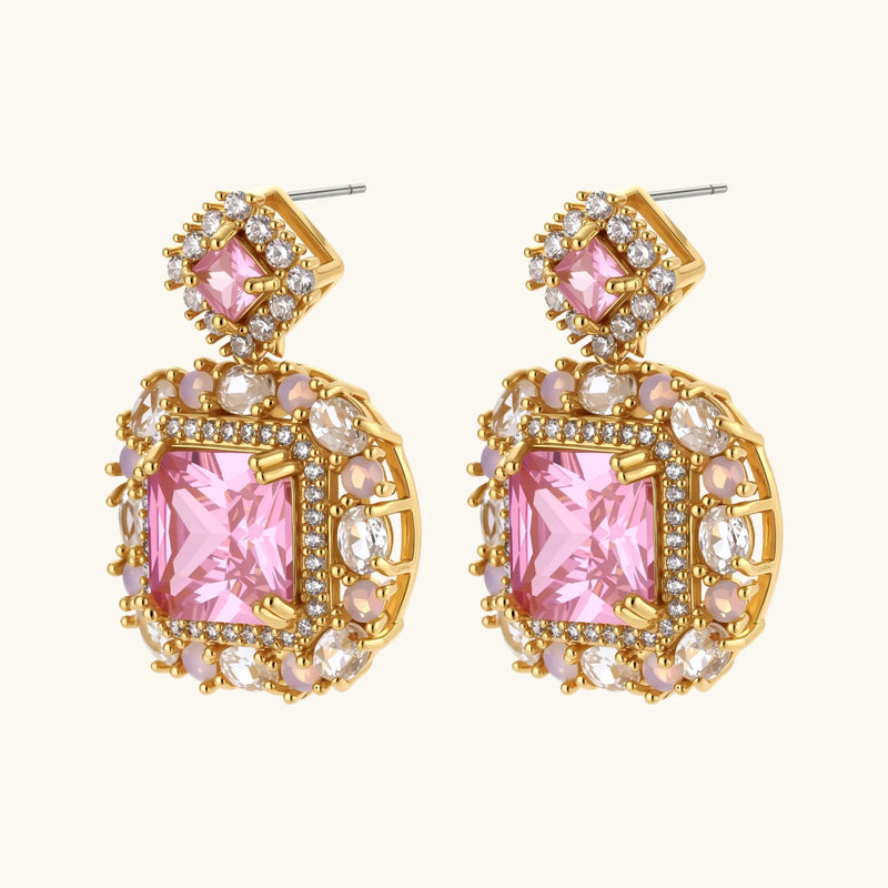 Close view of pink earrings from the heirloom square gold jewelry set adorned with zirconia designed by Astral Signature.