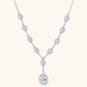 Close-up view of the Celestial Cascade Set by Astral Signature, highlighting the Y-shaped necklace with zirconia stones in a luminous design.