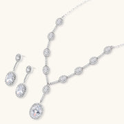Celestial Cascade Set by Astral Signature displayed with Y-shaped necklace and matching earrings, showcasing the elegance of white gold and zirconia.