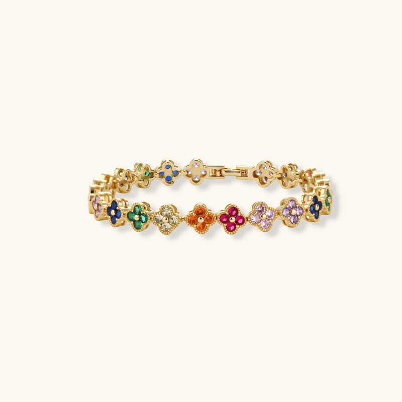 Image of the Lucky Clover Garden Set bracelet by Astral Signature, displaying colorful clover shapes embellished with shimmering zirconia stones.