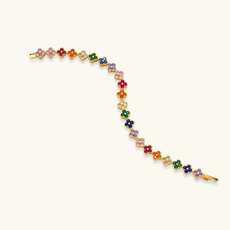 Artistic presentation of the Lucky Clover Garden Set by Astral Signature, featuring a colorful arrangement of clover elements that compose the bracelet.