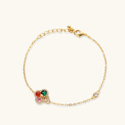 Bracelet from the Lucky Clover Jewelry Set Astral Signature™ Edit, featuring a delicate gold chain and a four-leaf clover motif set with multicolor zirconia.