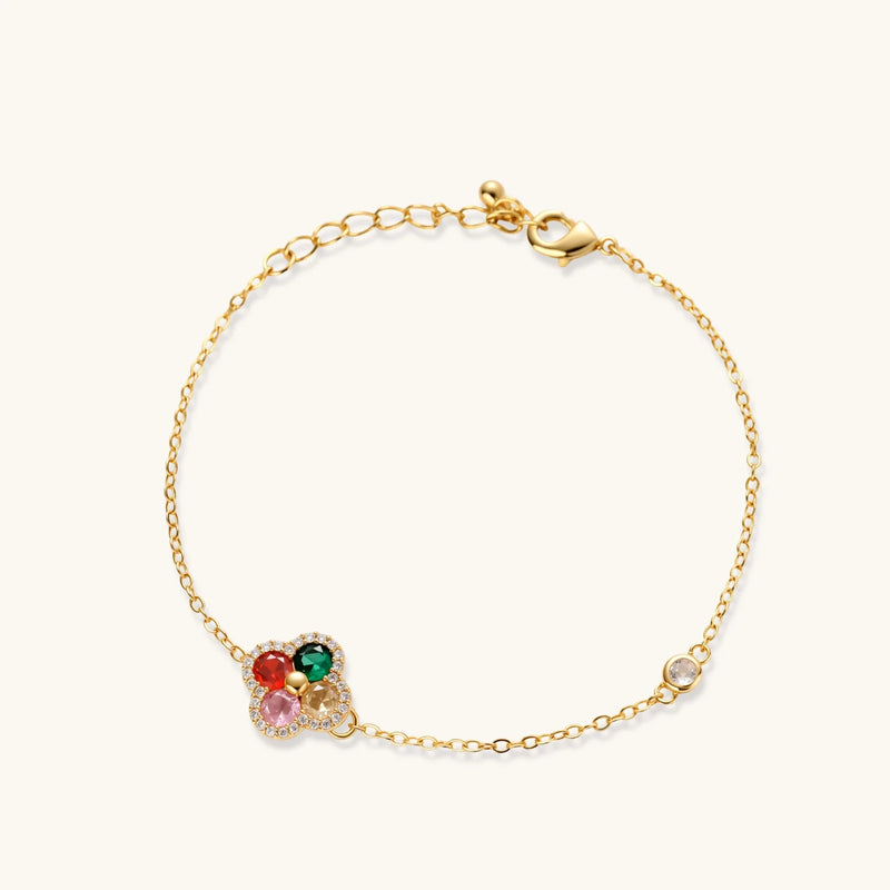Bracelet from the Lucky Clover Jewelry Set Astral Signature™ Edit, featuring a delicate gold chain and a four-leaf clover motif set with multicolor zirconia.