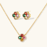 Lucky Clover Jewelry Set Astral Signature™ Edit displaying a coordinated necklace, stud earrings, and a pendant, highlighting the vibrant colors of multicolor zirconia.