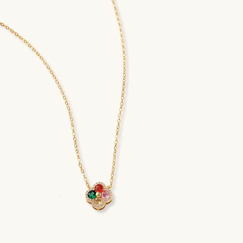 Necklace from the Lucky Clover Jewelry Set Astral Signature™ Edit, featuring a central clover design embellished with multicolor zirconia on a gold chain.