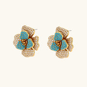 Detailed view of the floral necklace from Blooming Elegance — Blue and Pearl Jewelry Set in 14K Gold by Astral Signature™ with pearl elements.