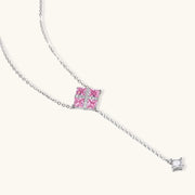 Elegant Pink Prism Cross Set jewelry by Astral Signature, showcasing the pendant necklace and pink zirconia design.