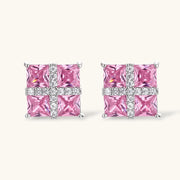 Beautiful Pink Prism Cross Set earrings by Astral Signature, featuring pink zirconia stones set in a cross pattern.