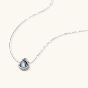 A detailed view of the silver pendant necklace from the Sphere Luxe Set by Astral Signature, showcasing its premium zirconia embellishments.