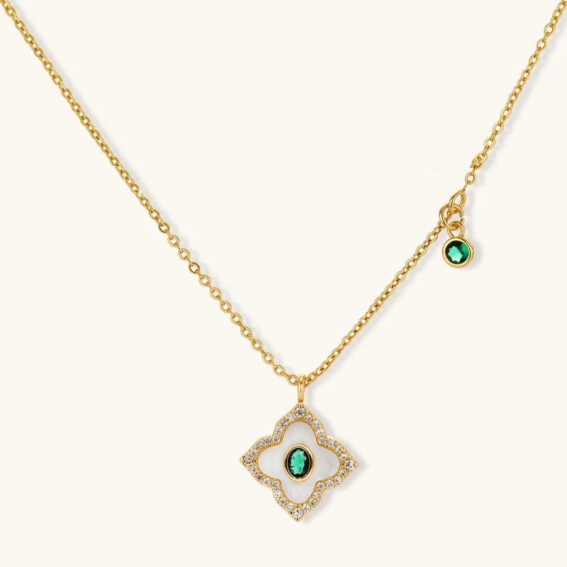 Close-up of the Emerald Radiance — 14K Gold Plated Emerald Zirconia Necklace from Astral Signature, part of the stunning Emerald Jewelry Set. The pendant of this 14K Gold Plated Jewelry Set shines with luxury and sophistication, making it a perfect choice for any Jewelry Set enthusiast.