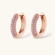 Close-up of the earrings in the Astral Signature™ Sparkling Confidence Set, featuring a polished rose gold finish and pavé zirconia.