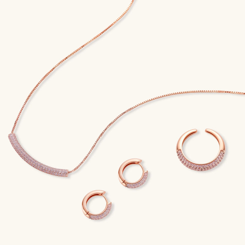 Stylish view of the Astral Signature™ Sparkling Confidence Set featuring matching necklace, earrings, and ring with intricate zirconia settings.