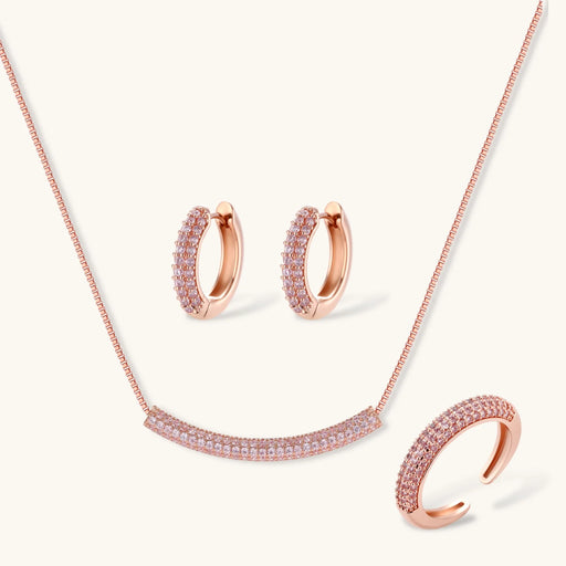 Sparkling Confidence Set by Astral Signature™ featuring a rose gold plated necklace, stud earrings, and adjustable ring, adorned with zirconia for a luminous look.