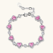 A beautiful bracelet from the Romance Heart Set, featuring pink zirconia hearts and sparkling accents, reflecting the quality design of Astral Signature™ jewelry.