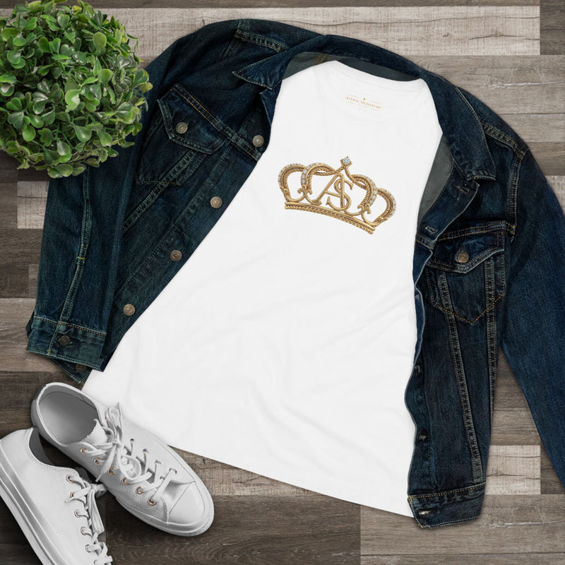 Flat lay of the Women’s Cotton Tee — Minimal Radiant A.S Golden Crown Lines Graphic by Astral Signature styled with denim jacket and sneakers. A versatile women shirt perfect for casual outings.
