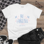The Be Fabulous Tee by Astral Signature laid flat with casual outfit components, emphasizing its versatility. This Inspirational Graphic Shirt is a stylish choice for women's fashion, making it easy to create feminine tee outfits for various occasions. A great addition to every women's wardrobe.