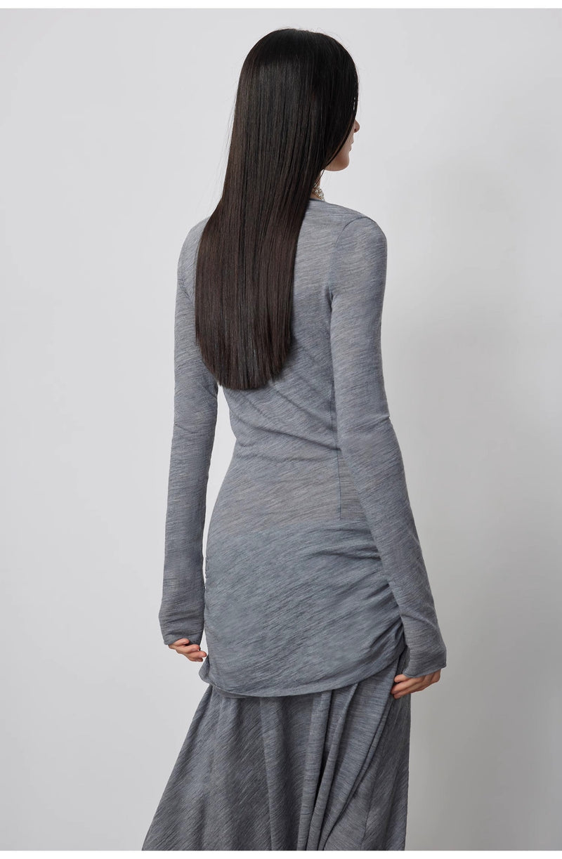 Elegant model showcasing the Dreamy Ball Wool Dress by PremiumStyle Co.,Limited, featuring a fitted dark gray upper and flowing asymmetric hem. This Asymmetric Hem Wool Dress represents a leading choice in women’s fashion for timeless style.