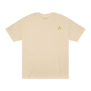 Unisex Classic Logo Tee by Astral Signature in warm beige, showcasing a minimalistic embroidered-style sunrise emblem over the left chest, ideal for everyday wear.