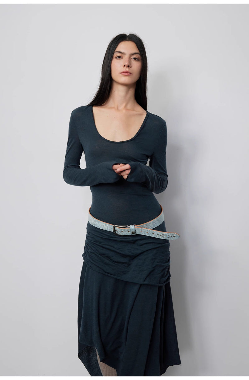 Model elegantly posed in the Dreamy Ball Wool Dress by PremiumStyle Co.,Limited wearing a dark blue gown accentuated by an asymmetric hem. This standout Asymmetric Hem Wool Dress showcases exquisite craftsmanship in women’s clothing.