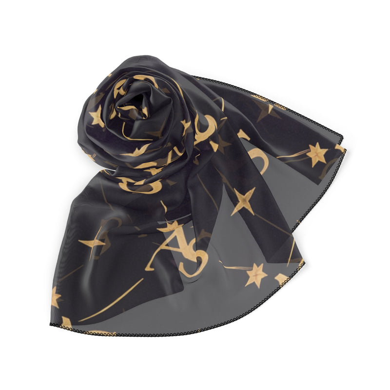The Monogram Astral Star Silk Scarf elegantly draped, highlighting the gold AS monogram and sheer material. Designed by Astral Signature, this poly scarf adds a sophisticated touch to your outfit. ACCESSORIES, poly scarf, scarf, Scarves.