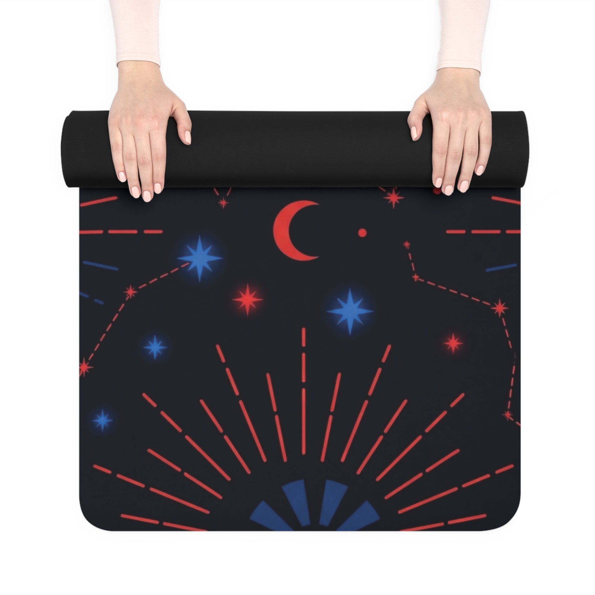 Hands rolling up the Rubber Yoga Mat — Cosmic Moon & Constellation Design by Astral Signature, revealing its striking celestial design. Ideal for astrology yoga enthusiasts, this exercise mat is a fantastic choice for those seeking a meditation mat that combines beauty and functionality for their yoga practice.