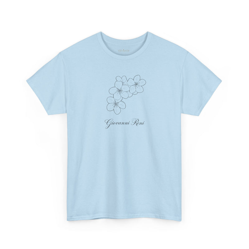 A close-up of the brand label on the Giovanni Reni Floral Script Tee, 'Guerrera Rosa', indicating it is a Women’s Relaxed Tee by Astral Signature.