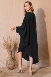 Back view of the Matte Crepe One Sleeve Dress by TYCHE, demonstrating its elegant silhouette and modern style. This dress in black is perfect for any event and is part of NEW ARRIVALS. Great for gifting, it's an essential in Women's Clothing. APPAREL, Black, CCPRODUCTS, DRESSES, Gift for Her, One Sleeve Dress, Women's, Women's top.