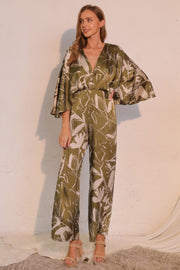 Astral Women's Jumpsuit - Olive Bloom Floral Satin Cape showcases a chic silhouette with wide-leg design and graceful cape detail, designed by TYCHE. A perfect choice for women who love elegant fashion. APPAREL, CCPRODUCTS, JUMPSUITS & ROMPERS, NEW ARRIVALS, Olive, Satin Cape, Women's Clothing, Women's Jumpsuit, Women’s.
