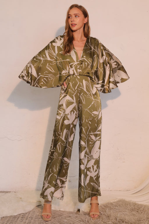 Astral Women's Jumpsuit - Olive Bloom Floral Satin Cape features a stylish design with a flowy cape overlay, perfect for any occasion. Discover this elegant jumpsuit by TYCHE in a refined olive color. Ideal for stylish women looking for a sophisticated outfit. APPAREL, CCPRODUCTS, JUMPSUITS & ROMPERS, NEW ARRIVALS, Olive, Satin Cape, Women's Clothing, Women's Jumpsuit, Women’s.