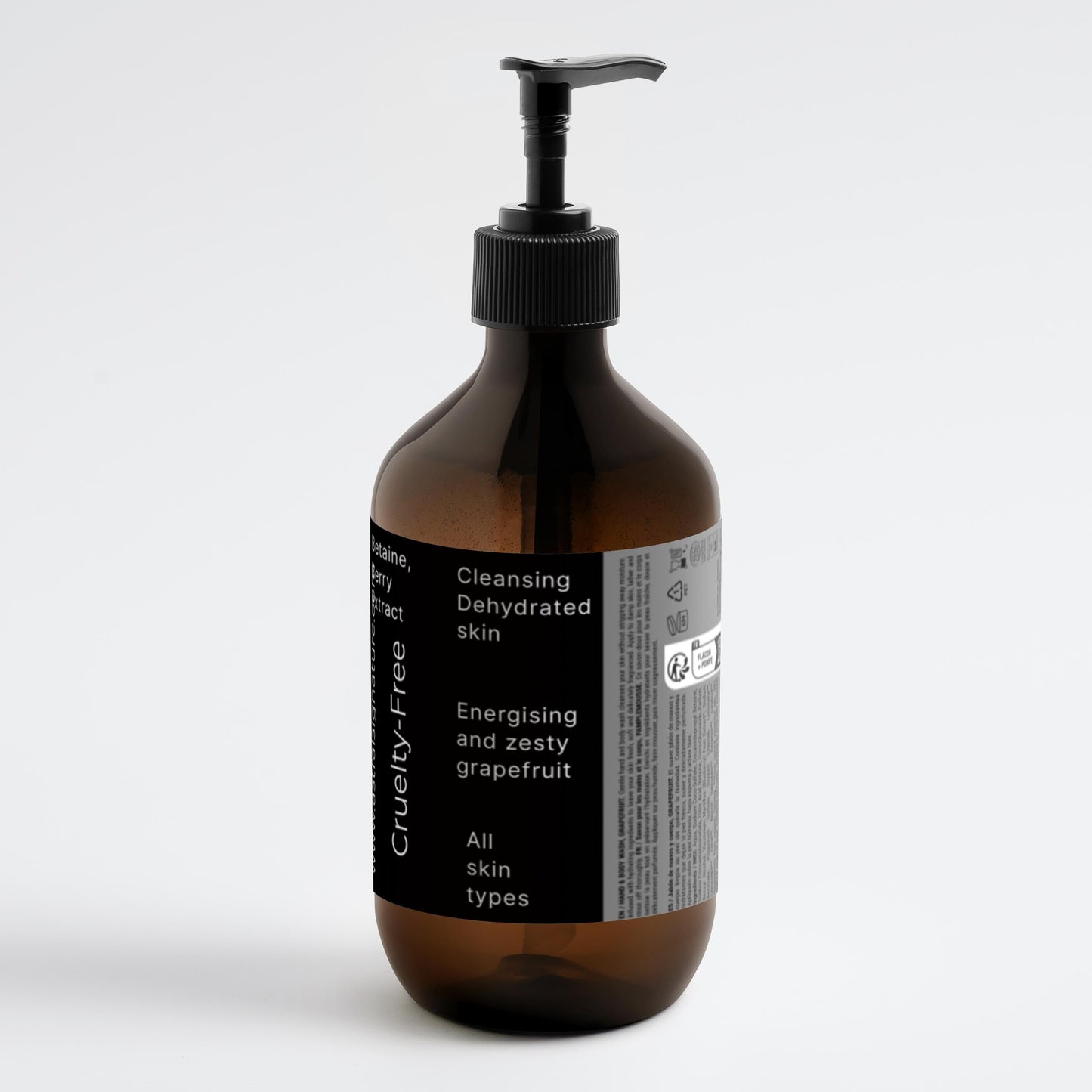 Astral Signature™ Hand & Body Wash Cleanses, Grapefruit in a minimalist amber bottle, suitable for all skin types. Formulated with Betaine, this hydrating body wash effectively cleanses dehydrated skin. A premium option for body-care, it combines gentle cleansing with a refreshing grapefruit scent while remaining vegan.