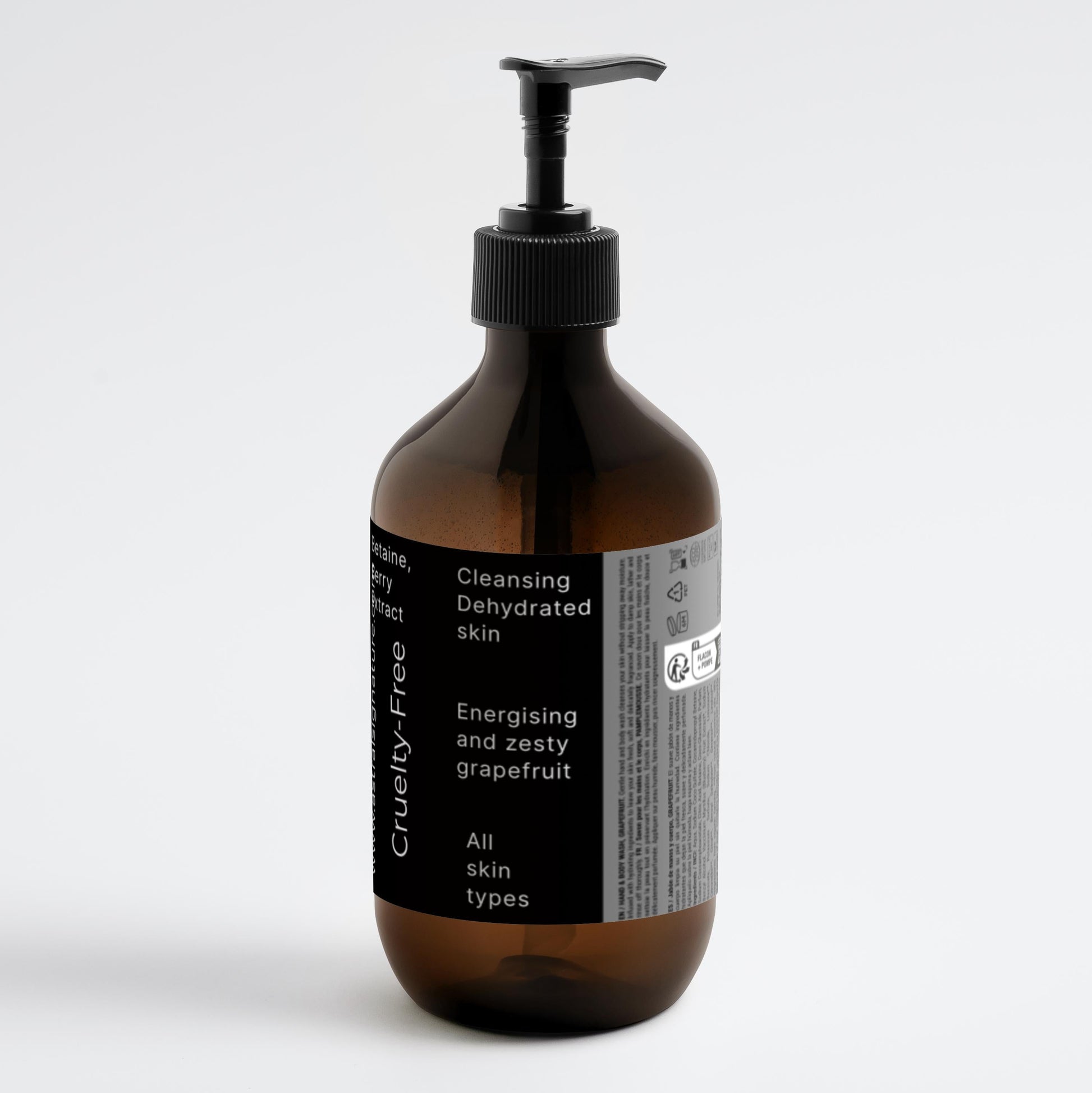 Astral Signature™ Hand & Body Wash Cleanses, Grapefruit in a minimalist amber bottle, suitable for all skin types. Formulated with Betaine, this hydrating body wash effectively cleanses dehydrated skin. A premium option for body-care, it combines gentle cleansing with a refreshing grapefruit scent while remaining vegan.