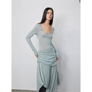 Model styled in the Dreamy Ball Wool Dress by PremiumStyle Co.,Limited, showcasing a light gray asymmetric hem gown. This women's dress exemplifies modern femininity and is an essential piece in women's fashion featuring the sleek design of the Asymmetric Hem Wool Dress.